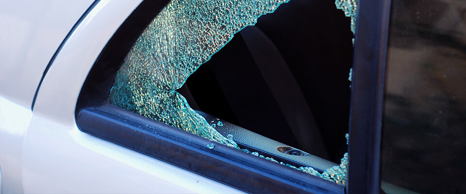 Smashed rear window of car