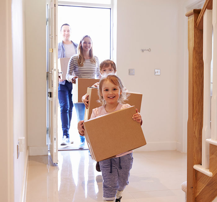 First time buyers family entering their new home